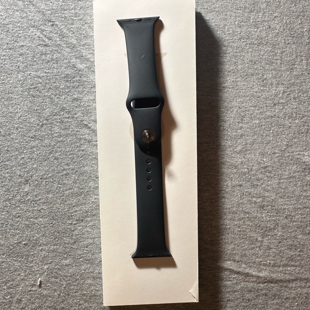 Apple. Black smartwatch band.